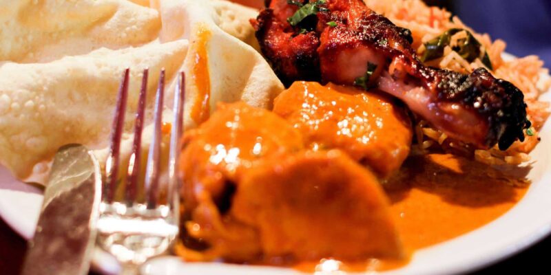 Office bigot refuses to admit that Indian food smells good